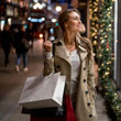 Image of woman shopping in the evening during Christmas time, holding shopping bags and smiling into a window.