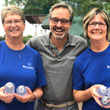 Image of Bank of Elk River Employees handing out water at the Riverfront Concert Series